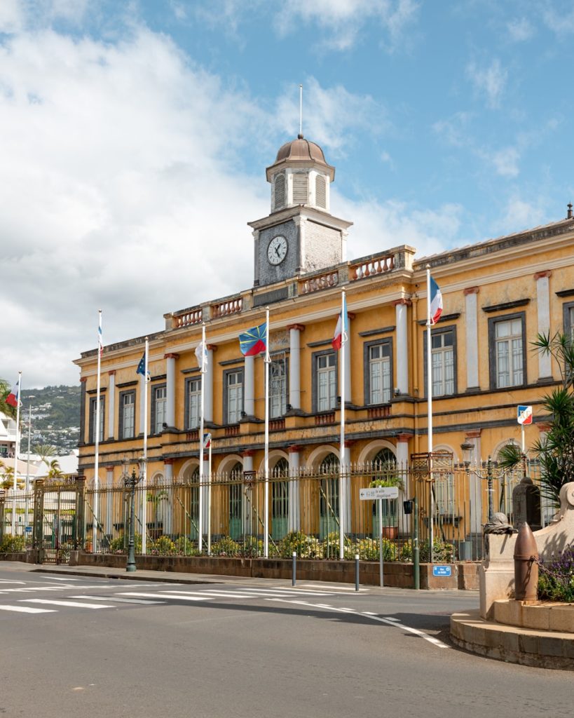 a large building with a clock on the top of it