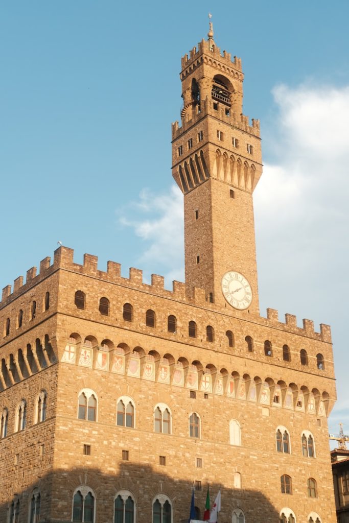 a large brick building with a clock tower