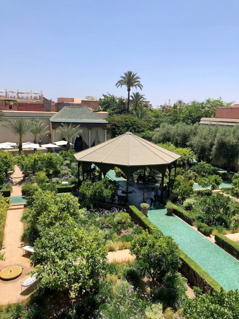 a gazebo in the middle of a garden