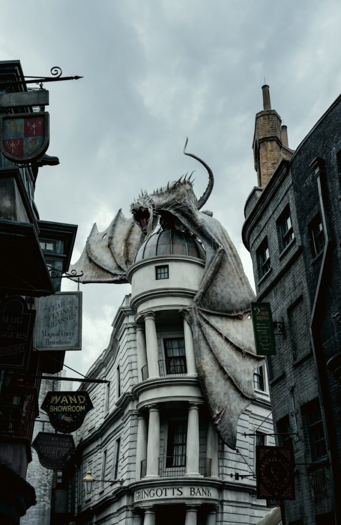 A large white building with a dragon on it's roof